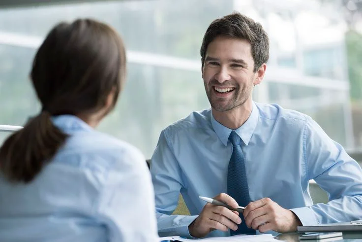 Two professionals in a business meeting.